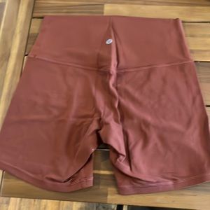 Lululemon workout shorts, burnt orange